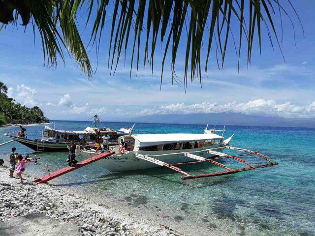 Follow our driving directions to Isla Verde, Batangas and arrive here at the Sampalucan Boat Stop in San Agustin Kanluran where Engracio's Beach Huts Rental is located.